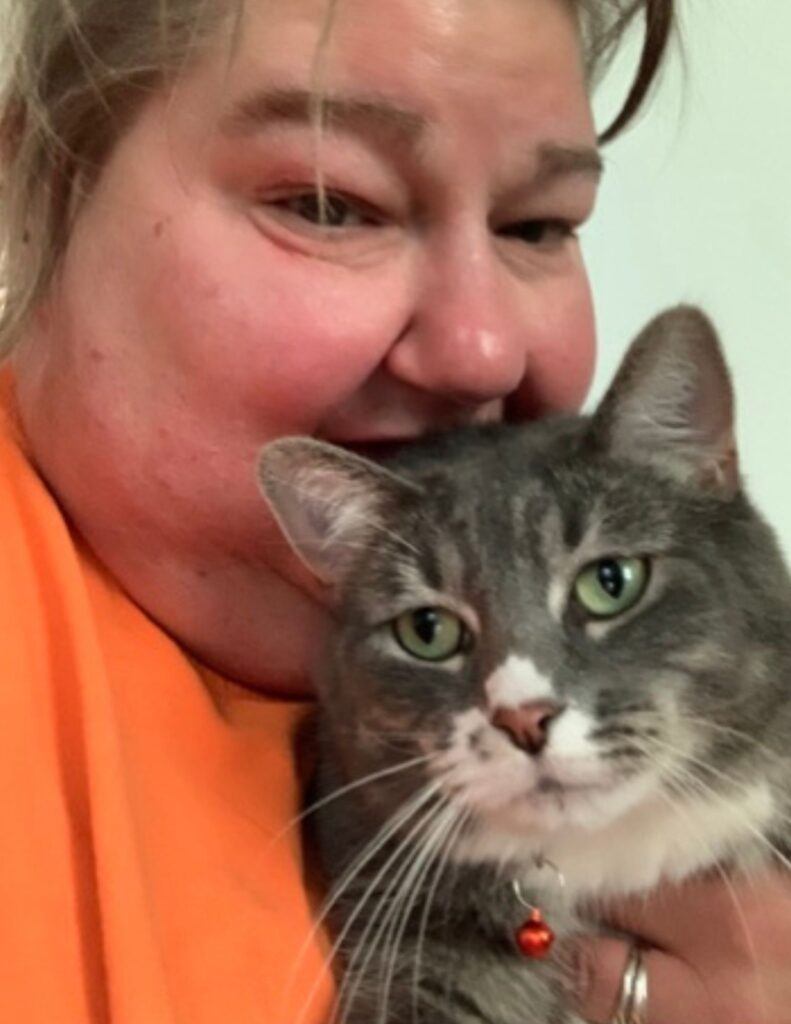 Ann Haasnoot holding binkie the cat